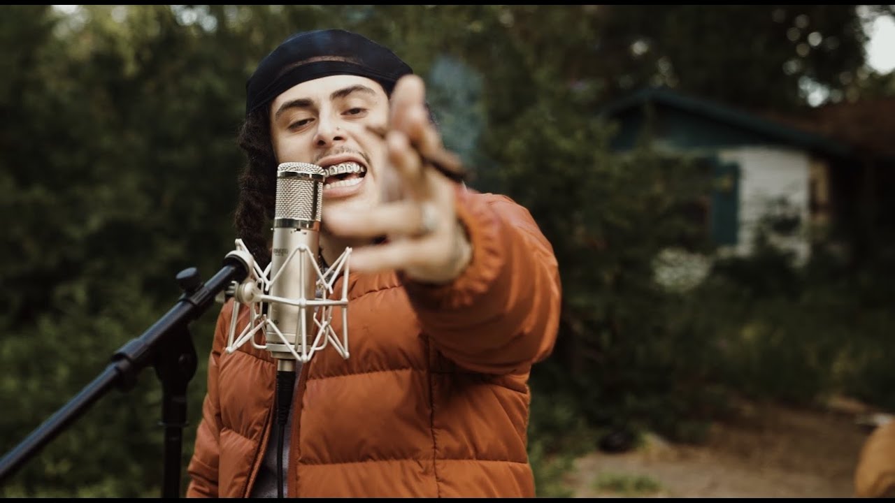 Southside Hoodlum at the microphone in the official video for Southside Story